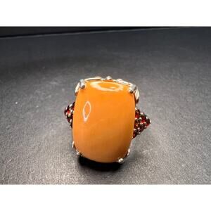 Elegant Caramel Opal and Red Garnet Gemstone Ring